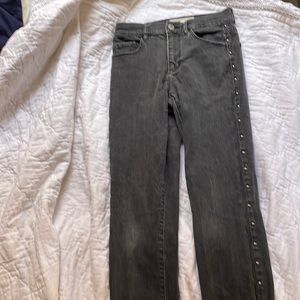 Black denim jeans with stud embellishment